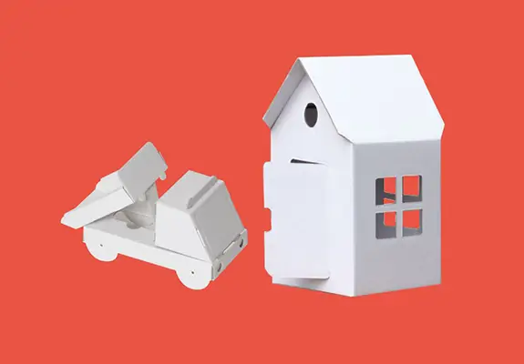 Stadt, Land, Fluss, auf Kipplaster und Haus aus Pappe auf rotem Hintergrund